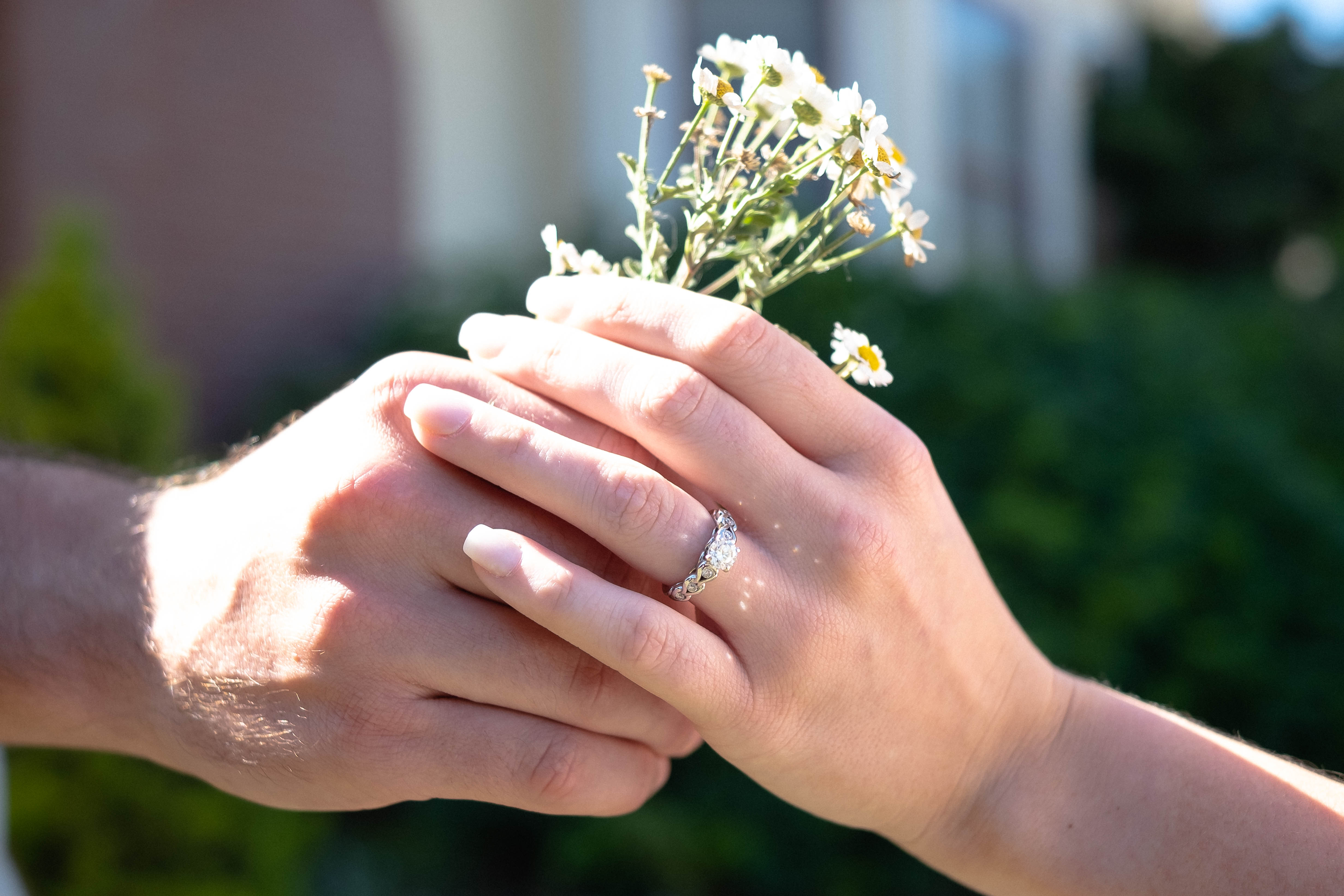 Engagement ring with white flowers