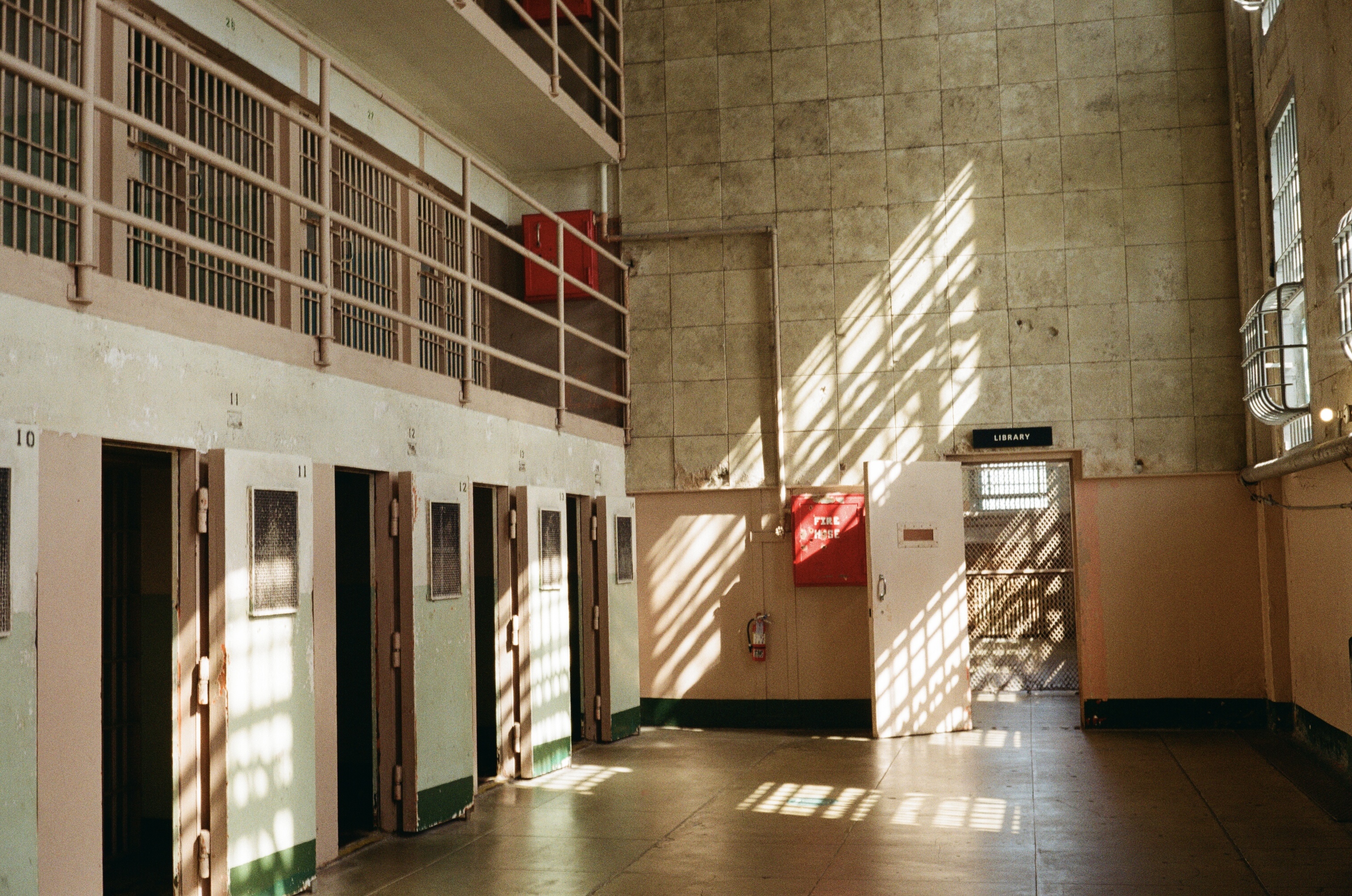 Prison interior with dramatic window light